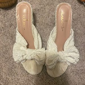 White bow block heels